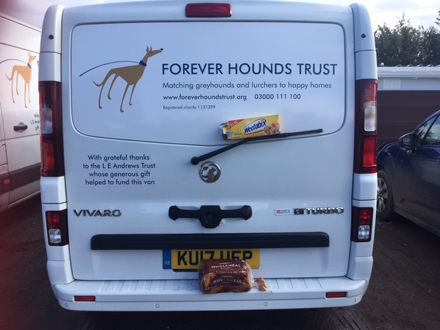Forever Hounds Trust van with a box of weetabix and loaf of bread