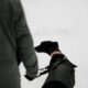 Man with black greyhound